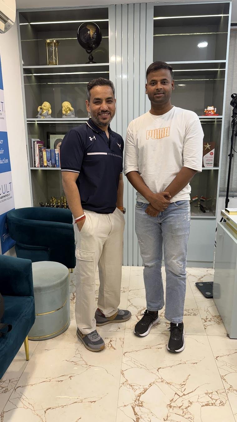 Dr Gaurav Solanki with a happy hair transplant patient at Cult Aesthetics Gurgaon